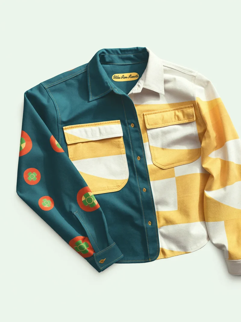 Illustration af en farveblokeret bomuldsovershirt vist fladt